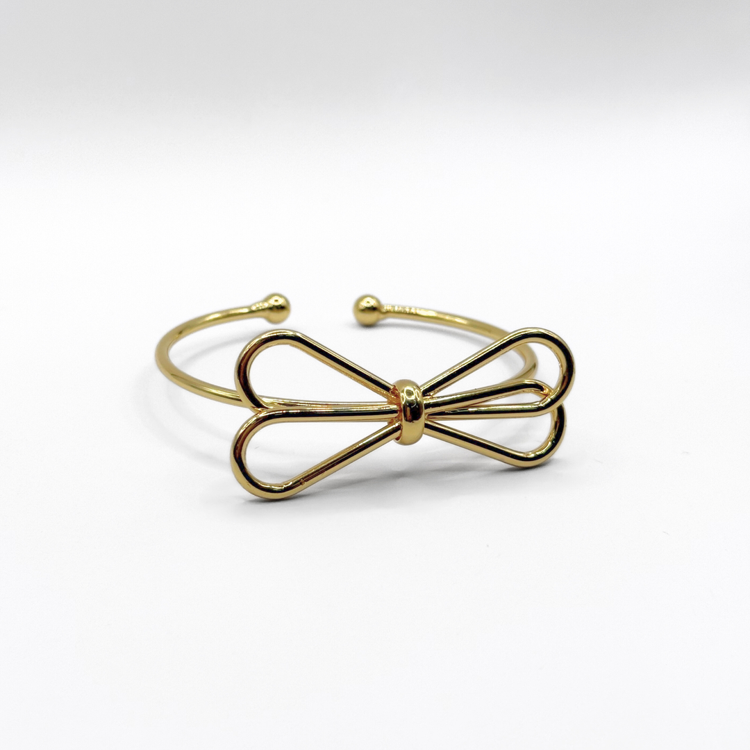 Emma Clara - Brazalete tipo Esclava Diseño Lazo Dorada