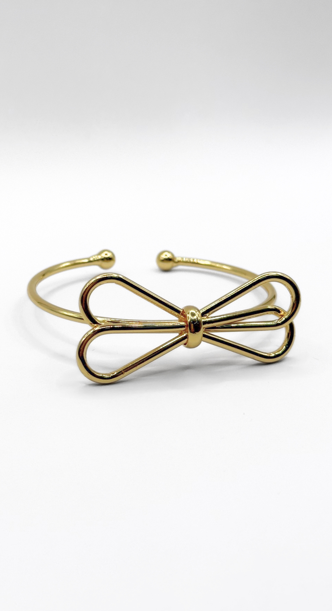 Emma Clara - Brazalete tipo Esclava Diseño Lazo en fantasía Dorada