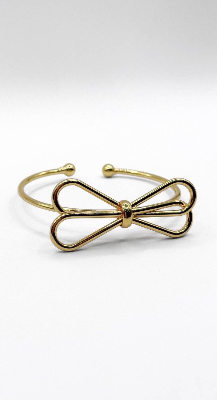 Emma Clara - Brazalete tipo Esclava Diseño Lazo en fantasía Dorada