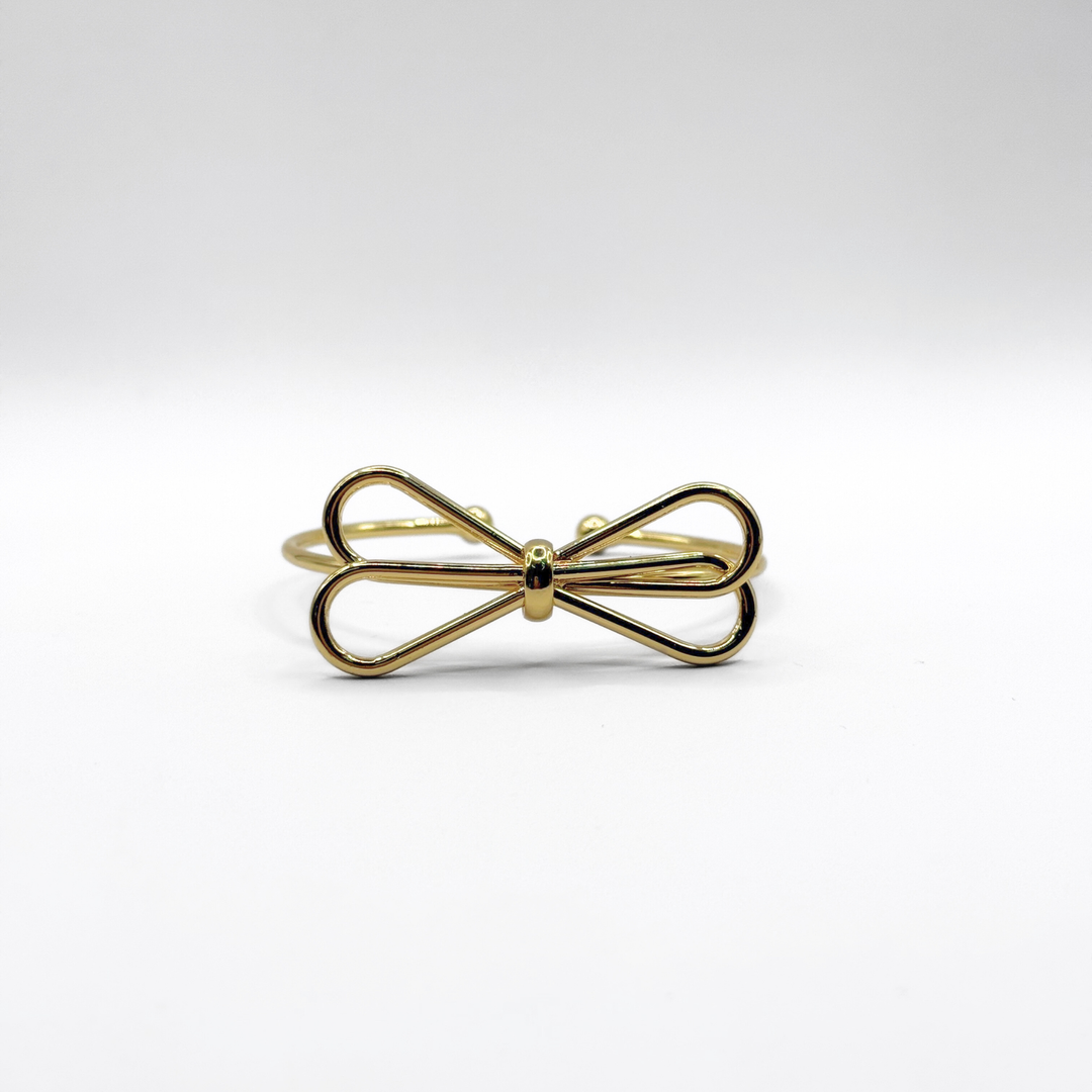 Emma Clara - Brazalete tipo Esclava Diseño Lazo Dorada