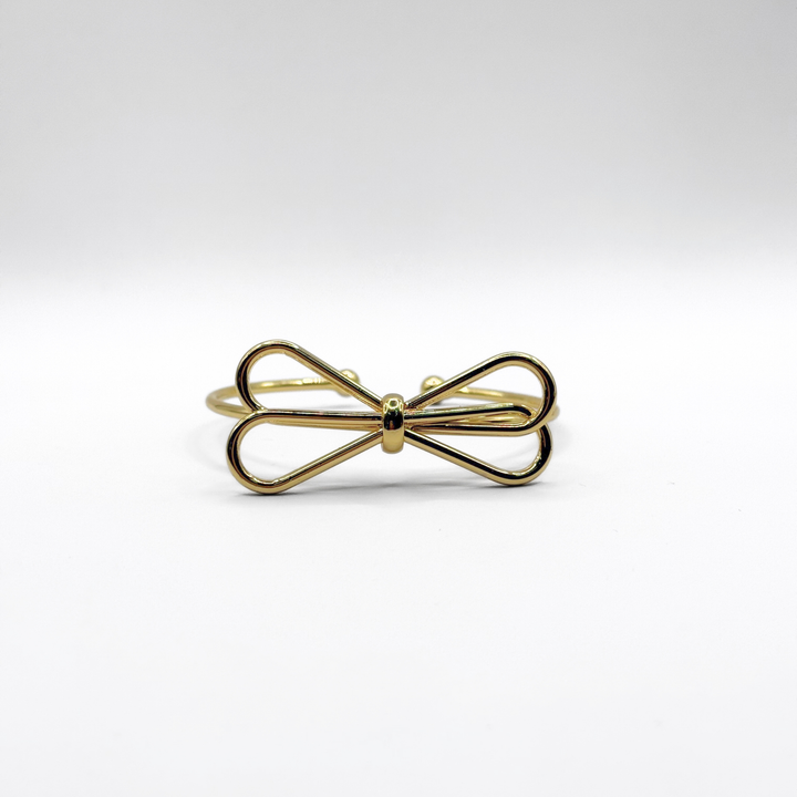 Emma Clara - Brazalete tipo Esclava Diseño Lazo Dorada