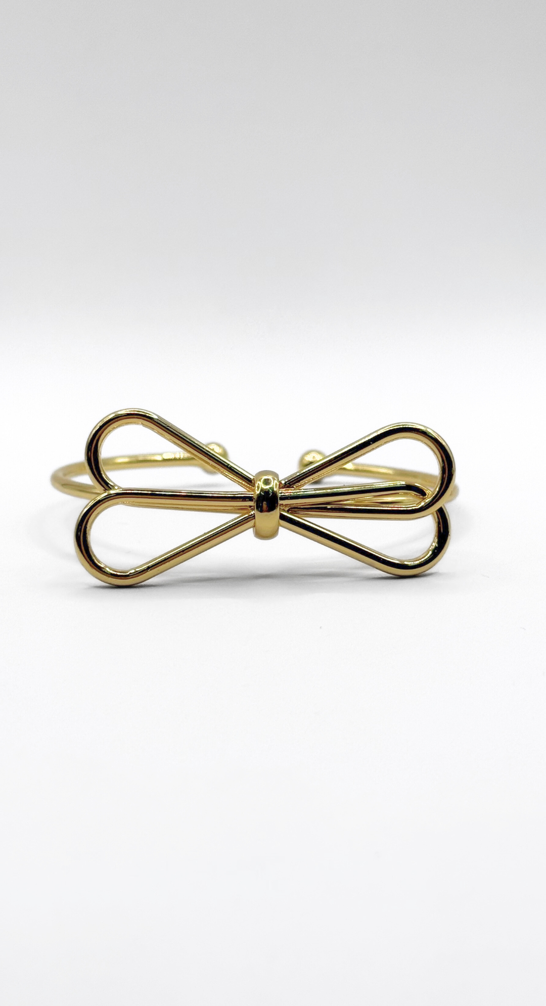 Emma Clara - Brazalete tipo Esclava Diseño Lazo en fantasía Dorada