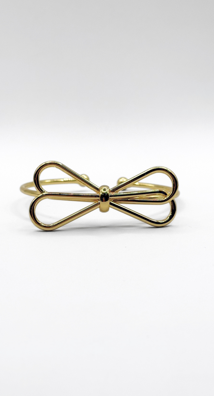 Emma Clara - Brazalete tipo Esclava Diseño Lazo en fantasía Dorada