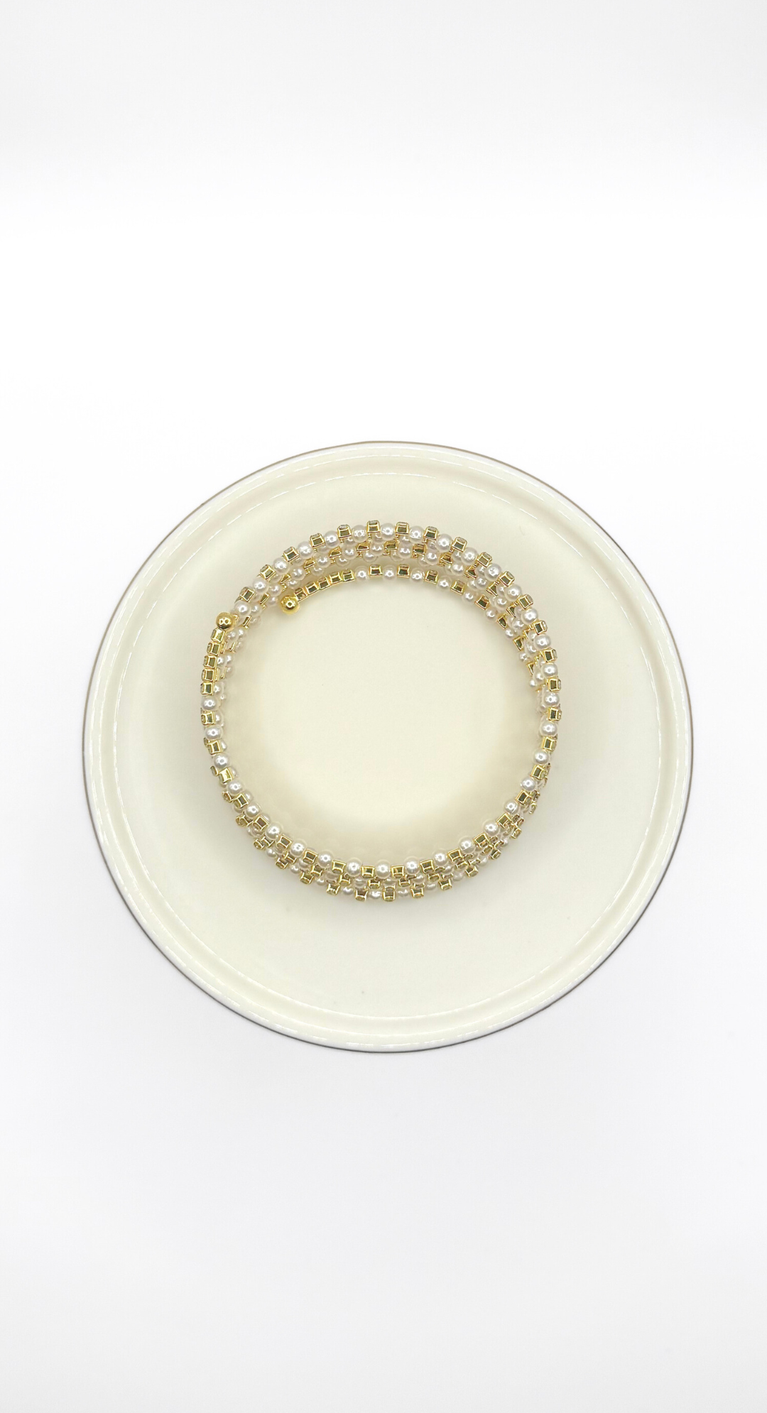 Emma Clara - Brazalete Espiral Perlas y strass en Fantasía Dorado
