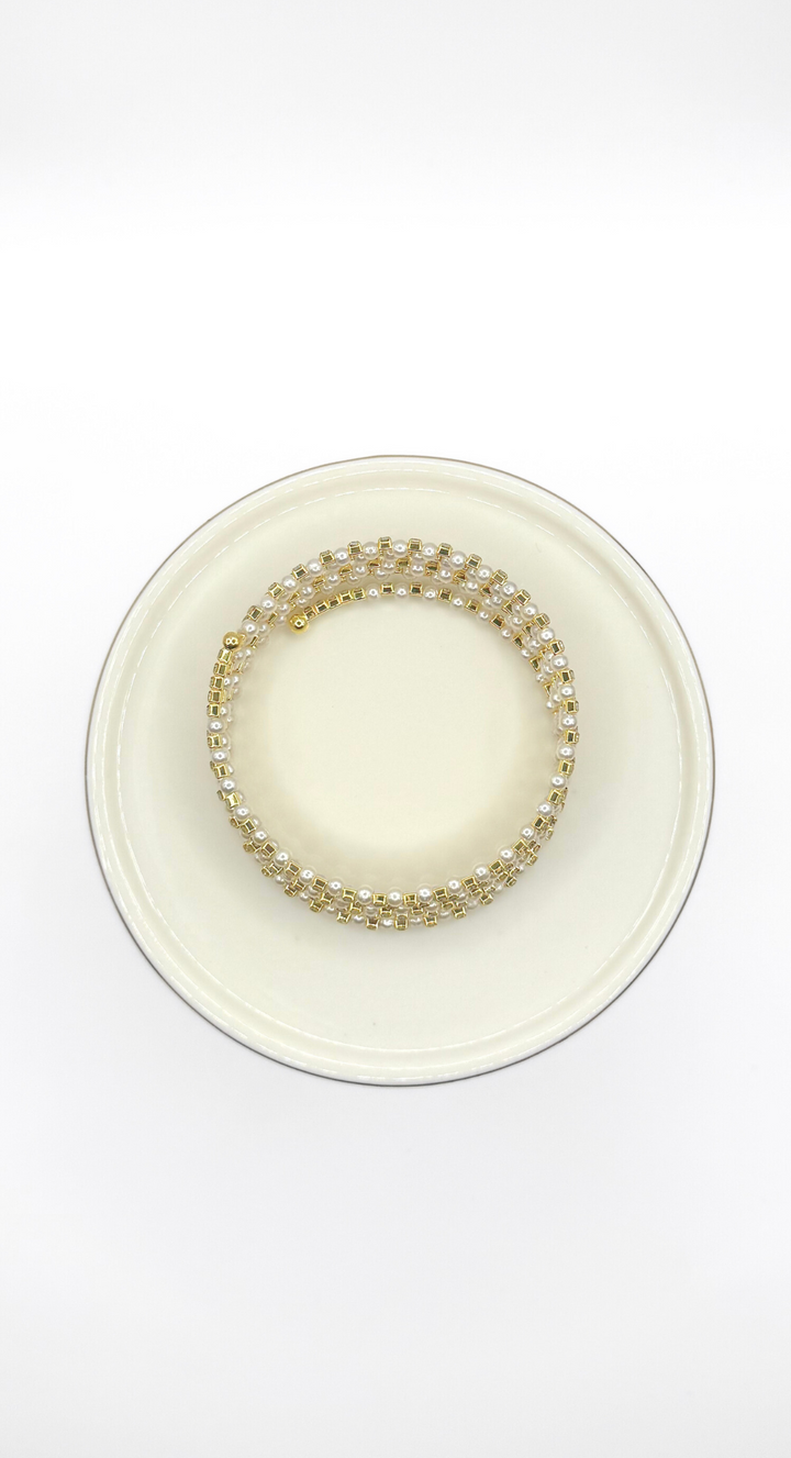 Emma Clara - Brazalete Espiral Perlas y strass en Fantasía Dorado